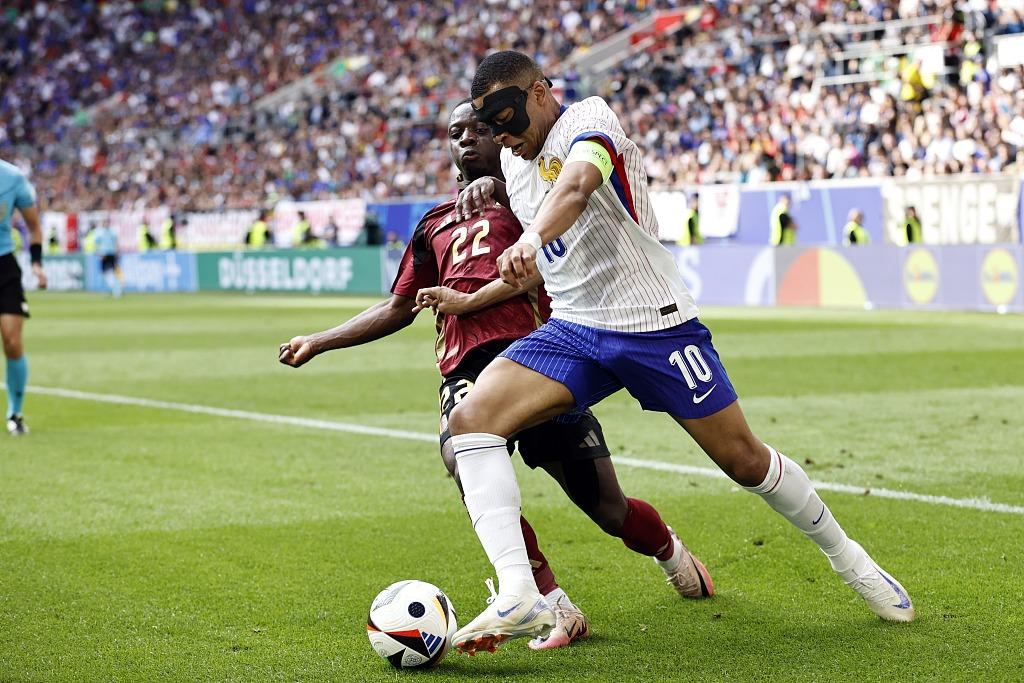 比利时队在激烈较量中取得胜利,成功晋级 比利时队在激烈较量中取得胜利,成功晋级